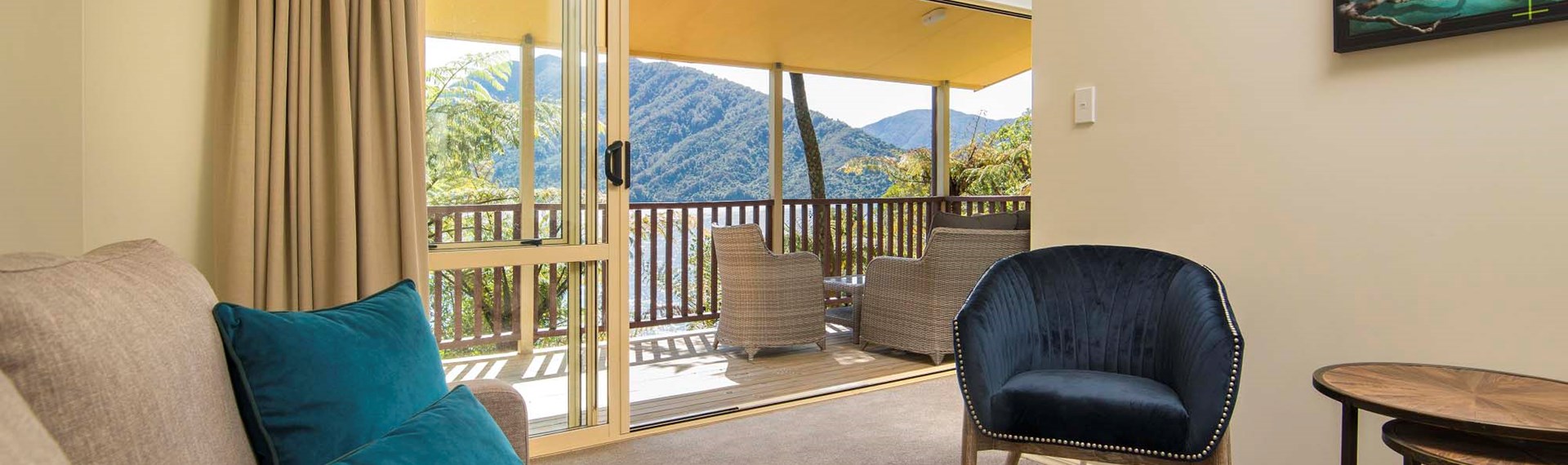 Mamaku Apartment accommodation rooms have a spacious lounge area with sofas and seating and private balcony at Punga Cove in the Marlborough Sounds in New Zealand's top of the South Island