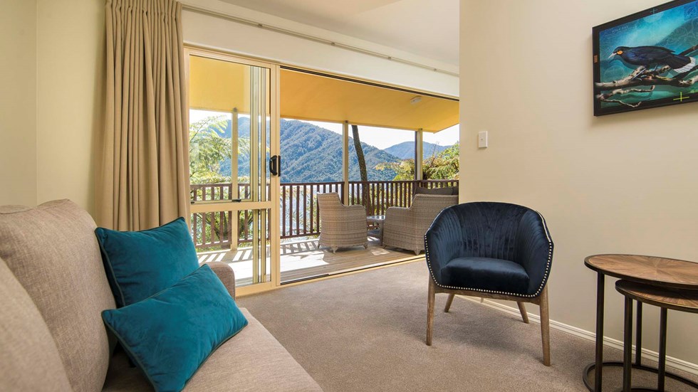 Mamaku Apartment accommodation rooms have a spacious lounge area with sofas and seating and private balcony at Punga Cove in the Marlborough Sounds in New Zealand's top of the South Island