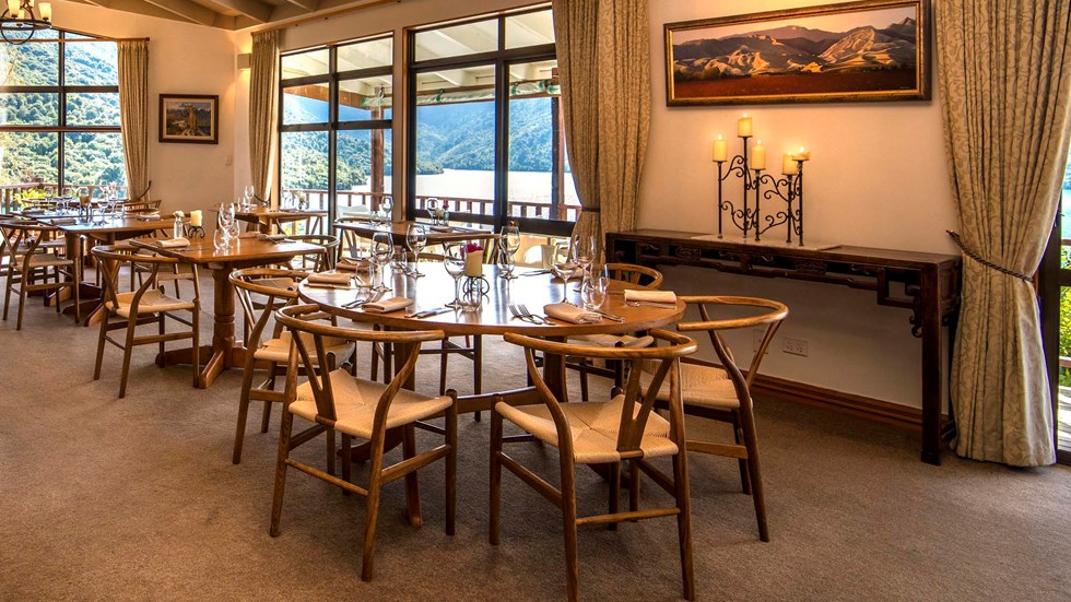 Dining at the Punga Fern Restaurant can be indoor or outdoor with seating available for each preference and surrounding views of Punga Cove and Endeavour Inlet in the Marlborough Sounds of New Zealand