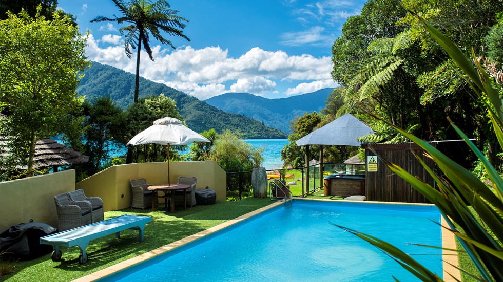 Swim at Punga Cove's accommodation pool which is one of the activities guests can do during their stay in the Marlborough Sounds in New Zealand's top of the South Island